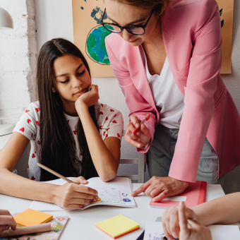 A teacher with students
